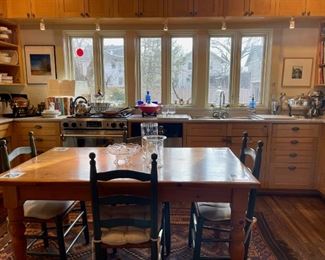 Kitchen table with rush painted chairs