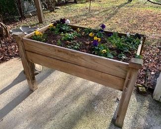 One of two raised garden bed boxes