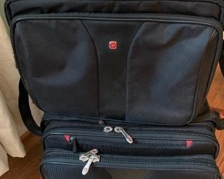 Swiss Army briefcase and pull behind bag