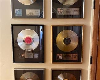 framed record sales awards...