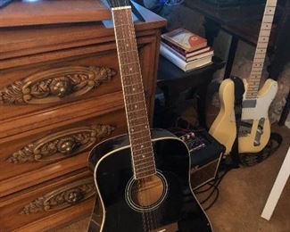 12 string Carlo Robelli guitar... (sorry electric guitar in background not for sale...)