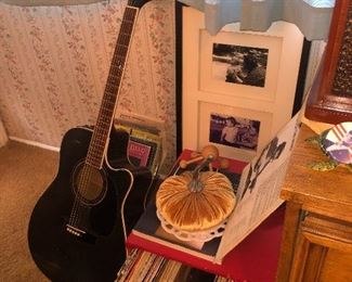 Nice guitar and several albums..