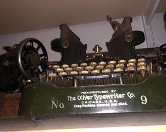 Several antique typewriters...