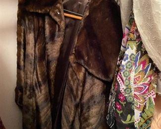 Nice vintage fur! There are two one from Woodland Hills Furriers and the other from Beverly Hills. Both in excellent condition!