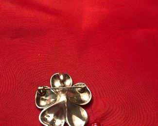 back side of april flowers pendant /pin