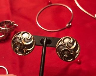 retired james avery 14 k gold and sterling  pieced  earrings-(french clip )  swirl. just polished. looks mint- $175