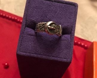 james avery  retired  sterling buckle ring - also just polished. approx size 8 $ 65