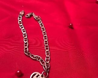 avery little sister charm -on NOT AVERY   but sterling bracelet 
