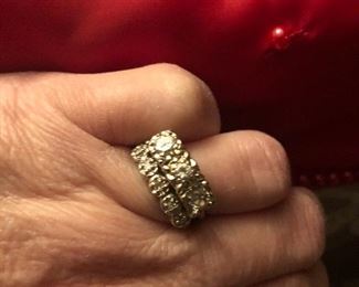 white gold estate piece worn marks  but tested good-  3 diamonds top row and row of smaller diamonds bottom- soldered  so 1 ring wedding set-  happy to go have this tested  for everyone's satisfaction if u choose to buy it $450 it may be 18 k. size approx 8