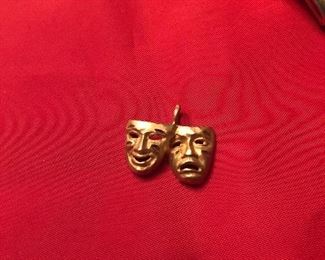 14 k gold drama charm not avery   but solid and good piece $85 barely over melt  fairly heavy for a small charm 