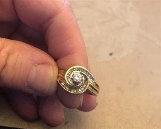 14k yellow gold wedding/engagement ring small brilliant round center stone and baguettes on the sides. Size is approx 7.5-8 price is $269