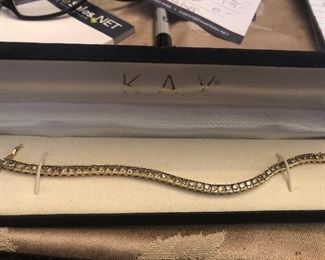 Lovely 10k yellow gold tennis bracelet  it may or may not be from Kay. It was in this box when I got it to sell. It is approx. 13 gr. Or so plus the diamonds. Price is $599 