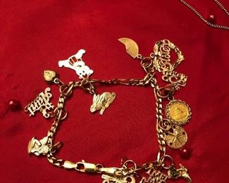 Solid 14 k gold charm bracelet. Not Avery but very nice $565 