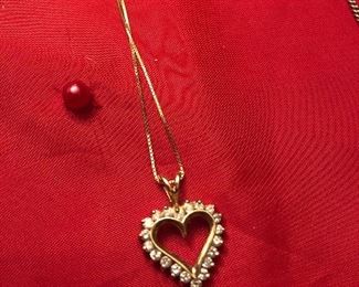 10 k yellow gold and diamond heart pendant and long 10 k chain -valentines is near- $125