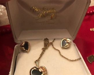 10 k gold set-(black hills) pierced  post earrings and pendant -all 10 k and stamped= chain  is 1/20-14k - so not solid on the chain - rest is real and pretty in person-  sold as set only $149