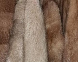Vintage and modern ladies clothing and accessories. Fur coats, stoles and collars