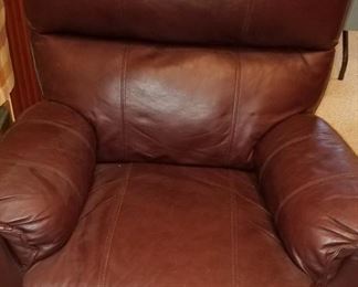2 brown leather recliners/rockers