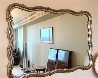 Beautiful Decorative Wall Mirror - lovely tones of gold and silver compliment this wonderful mirror. It would blend in with a variety of home decors. Some minor imperfections, however; not overly noticeable. Measures 45" x 31" 