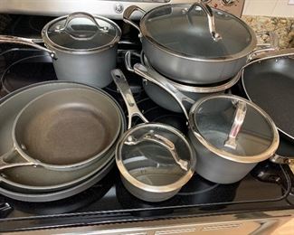 Kirkland Cookware Set - includes eight pieces by Kirkland and two additional pieces that are not Kirkland. All are in good/gently used condition. Some pieces are more used than others and some are in like new conditon.