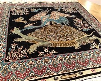 Oriental Silk Rug/Wall Hanging. Truly a beautiful piece of work! Has hooks on the back to hang up on the wall. Features a floral design, turtle and birds. Measures 23"x 23"