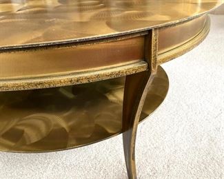 Simply Stunning Brass Round Coffee Table in an amazing burnish/brushed finish. This does have some slight wear issues on the top including "ring" marks from drinking glasses. However, it does not take away from the beauty of this truly stunning table! It is quite heavy and measures at 17" H and 38" across.