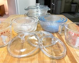 Kitchen Items; glass casserole dishes by Anchor Hocking (2 quart and 1.5 quart), two sets of pyrex nesting mixing bowls and measuring cups 