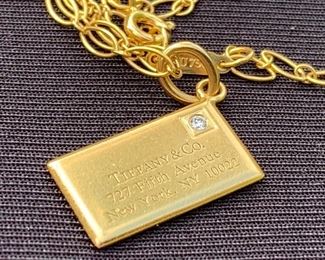 Tiffany and Co 14k gold chain and envelope pendant