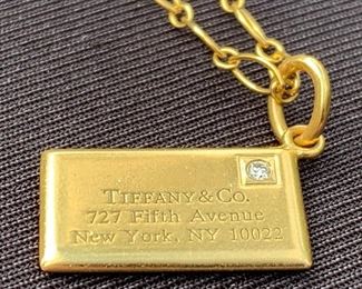 Tiffany and Co 14k gold chain and envelope pendant
