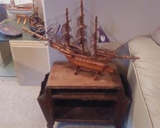 Several large wooden model boats