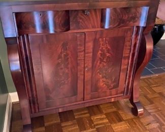 24.  19th C. American Empire flamed Mahogany cabinet.  44"Lx44"Tx20"D (23" to the deepest). $475