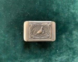 $35  Vintage white metal march safe