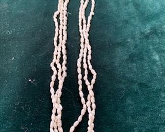 **Now $20** $25  3 strand baroque seed pearl and angel skin coral/GF clasp