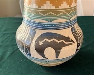 $20  R. Lynch (Navajo) 7" tall pot, small chips on rim