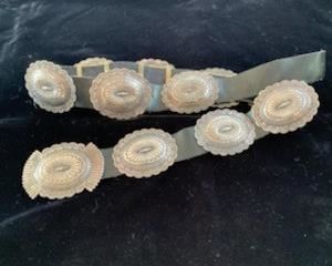 $650   Suzie James (Navajo) sterling concho belt ca 1990, belt length 46", buckle and (10) 3" x 2 1/2"  conchos
