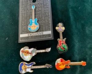 $20/group  Hard Rock Cafe guitar pins