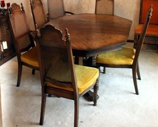 Mid Century American Furniture Co. Dining Room Table, 28.5in X 62in X 44in (Includes Leaf), With Cane Back Chairs, 2 Captain, 4 Dining Chairs