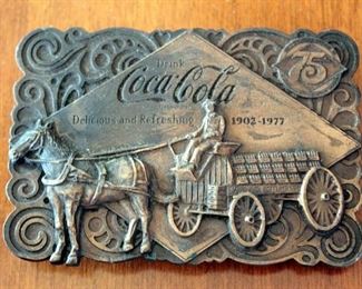 Collectable Mirrored Coca-Cola Tray 11.5in x 16in, Brass Coca-Cola Belt Buckle, And Paul Bear Bryant Cola-Cola Glass Bottle 6 Pack