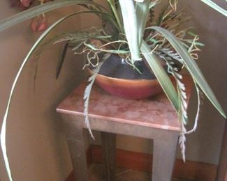 Marble topped table with a metal base.