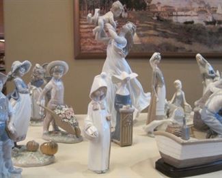 Table full of Lladro Figurines.
