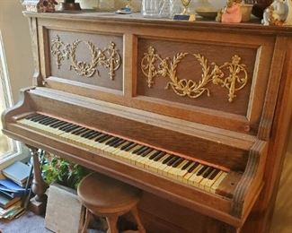Amazing antique piano. Antique glass ball claw foot piano stool sold separately, old sheet music and music books