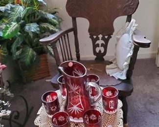 Ruby cut crystal pitcher and glass tumblers set, 1800's rocking chair, faux plants