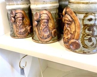 Interesting mugs with face resembling Nostradamus