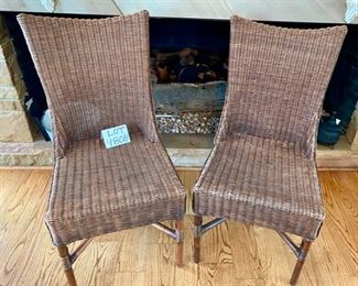 Lot 4808.  $150.00. Nice Pair of Vintage rattan side chairs, unbranded, in great condition very little wear but could use a stain touch up in a couple spots. 37" H x 17" W x 17" seat depth	