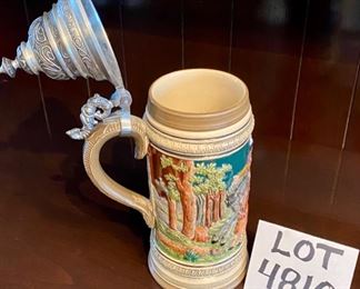 Lot 4810. $25.00   Limited Edition #1328 - West Germany, Ceramic stein with pewter lid. The Walt Lim Ed - DF10000 on bottom 12" H x 3.5" Diameter	