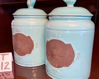 Lot 4812.  $80.00/pr  2 Home Essentials & Beyond Canisters (Large 17702) in a pretty shade of Robin's Egg Blue.   Rooster handle on lid with chalk painted label on the side of the canister.  With a piece of chalk you can label it for flour, sugar , cookies... the choice is yours!  Cute idea.	12" H x 5.5" diam.
