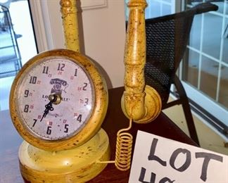 Lot 4815. $18.00  Vintage farmhouse repro Louisville metal telephone decor in distressed yellow finish.	11" H	