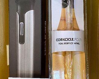 Lot 4825. $25.00.  Brand New Wine Service Set: Houdini Electric Corkscrew by Rabbit and "Corkcicle. Pour.  For Perfect Wine"		