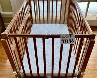 Lot 4846. $75.00. Vintage 1960s wooden playpen or portable crib - Measures 39.5" Long, 25.5" wide and 27" tall.  Has nice and safe 2" inbetween rails, so no chance of a baby getting head trapped.  Very clean and newer mattress.  Perfect for Grandma's home and can be folded up and stored when not in use!  