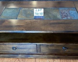 Lot 4838 $175.00. "Santa Fe" by Mission Furniture Style Coffee Table with Storage and tile or slate inserts on the top, measuring 24"tall, 18" deep x 48" long.  Again, dove tailed construction make this line a tribute to form and function.   