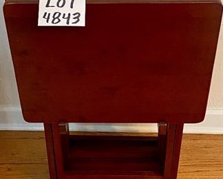 Lot 4843. $60.00. Set of four handsome dark wood TV trays with stand - always nice to have on hand!